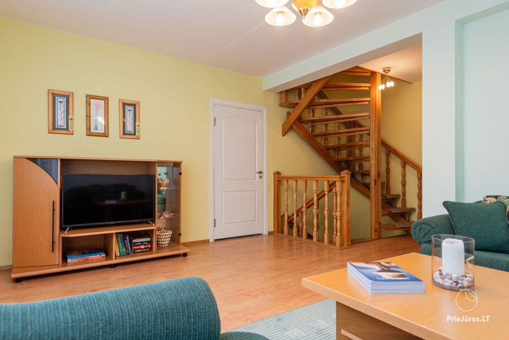 Przytulny domek Family Inn z tarasem