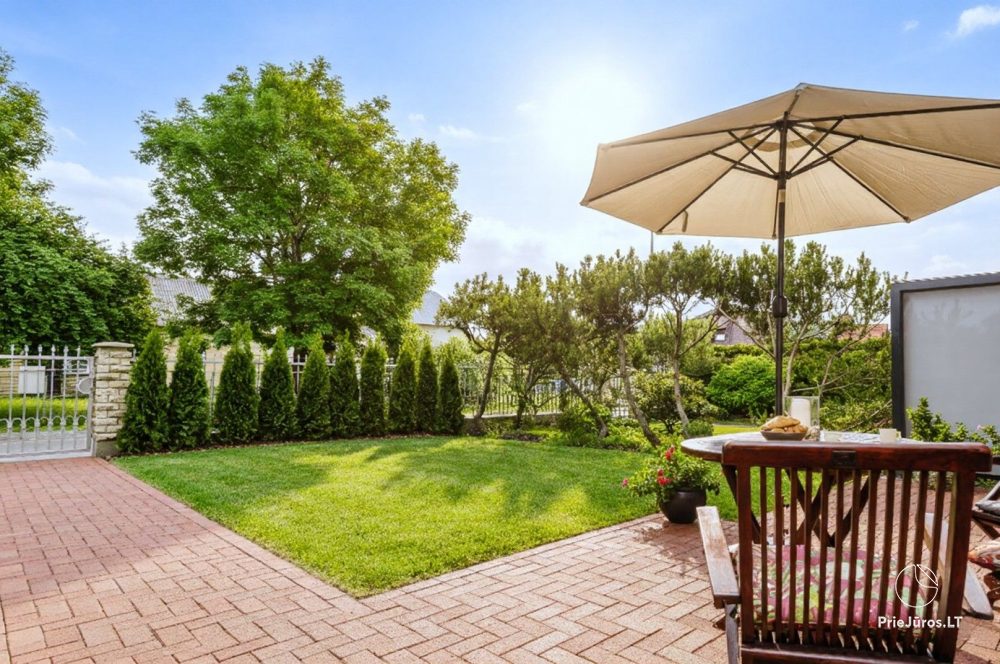 Przytulny domek Family Inn z tarasem