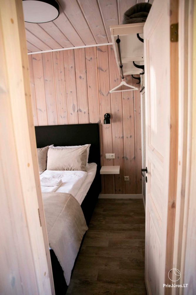 Apartamenty i domki do wynajęcia w Połądze, w blisko morza znajdującwej się zagrodzie „Pajurio Vingis”