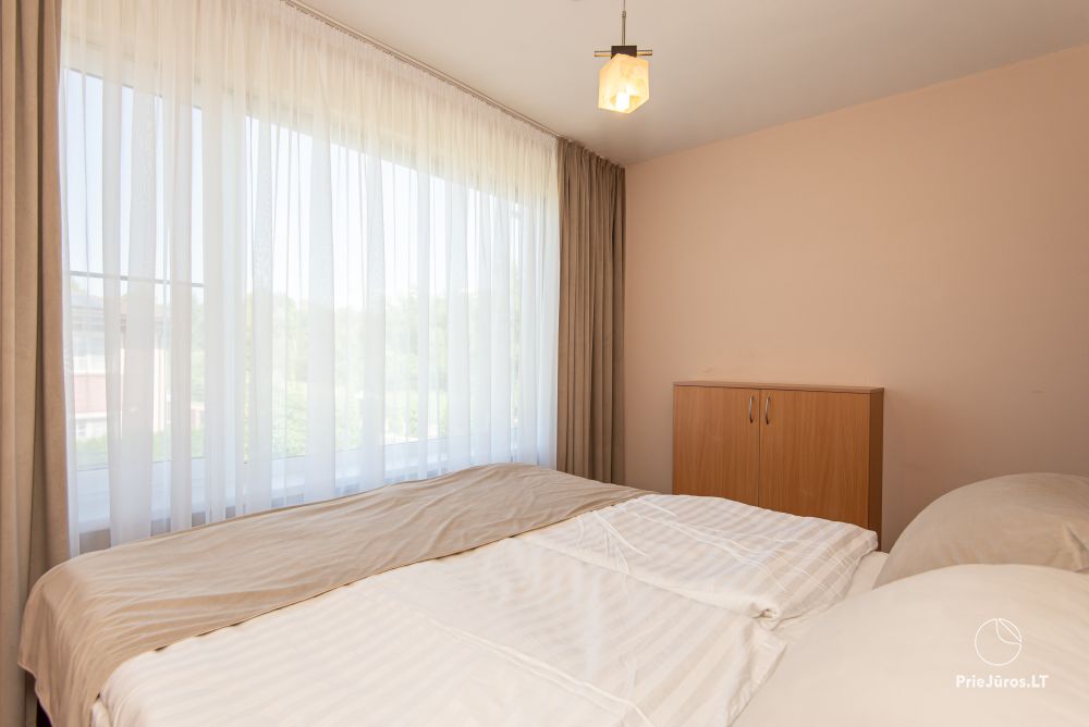 Apartamenty i domki do wynajęcia w Połądze, w blisko morza znajdującwej się zagrodzie „Pajurio Vingis”