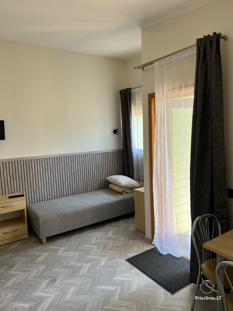 Vilnelė  Kompleks rekreacyjny: domki letniskowe, apartamenty, pokoje do wynajęcia blisko morza