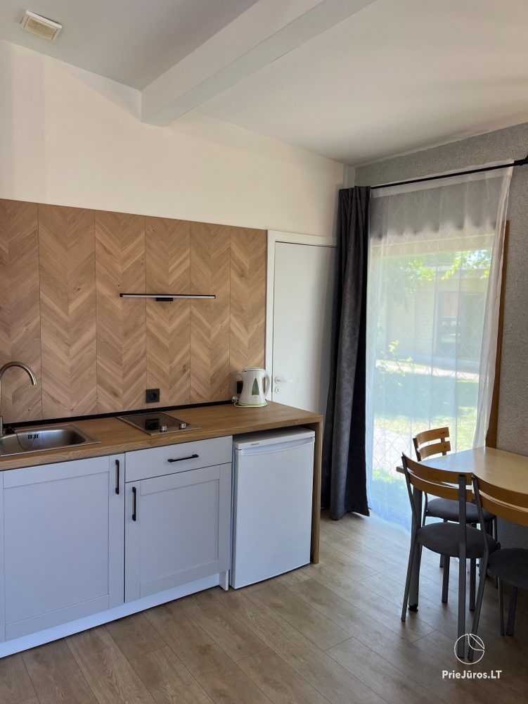 Vilnelė  Kompleks rekreacyjny: domki letniskowe, apartamenty, pokoje do wynajęcia blisko morza
