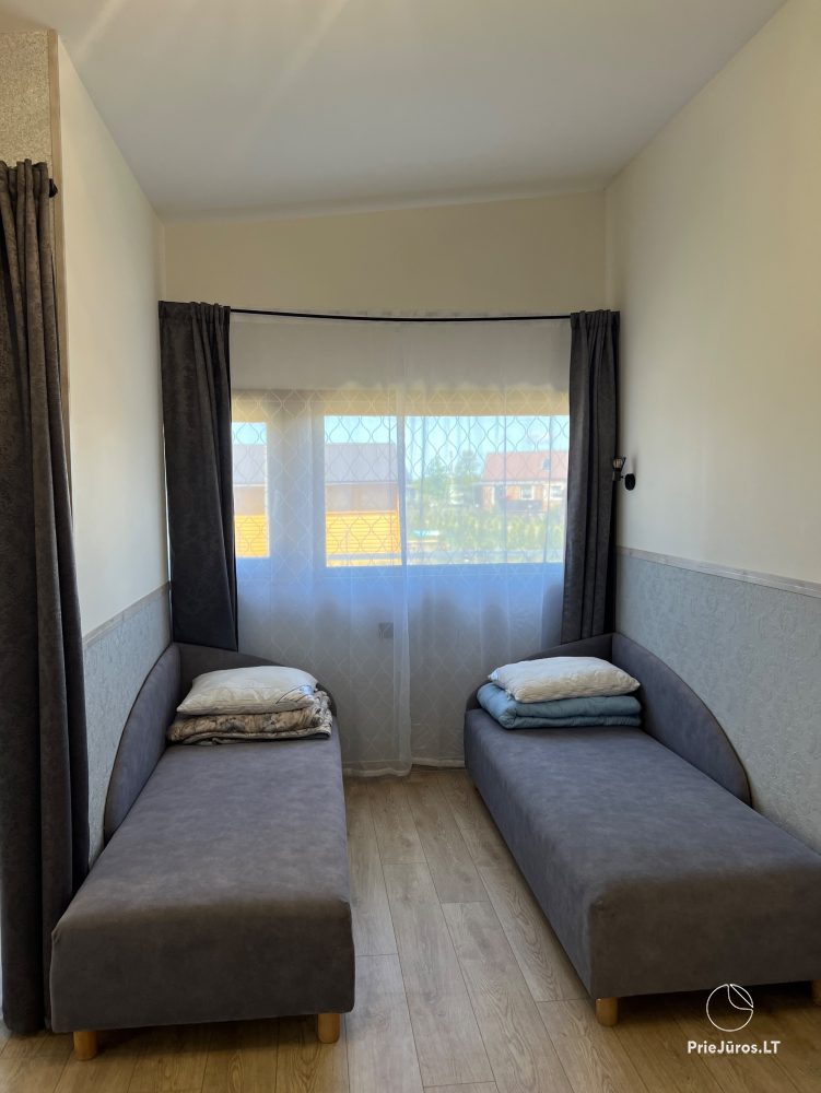 Vilnelė  Kompleks rekreacyjny: domki letniskowe, apartamenty, pokoje do wynajęcia blisko morza