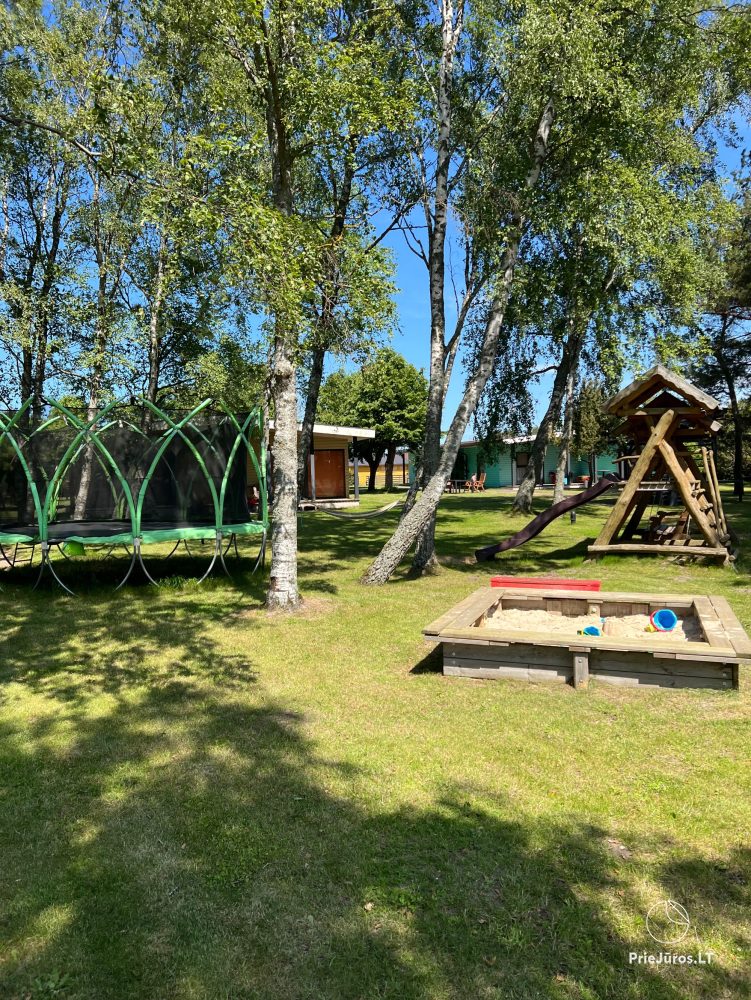 Vilnelė  Kompleks rekreacyjny: domki letniskowe, apartamenty, pokoje do wynajęcia blisko morza