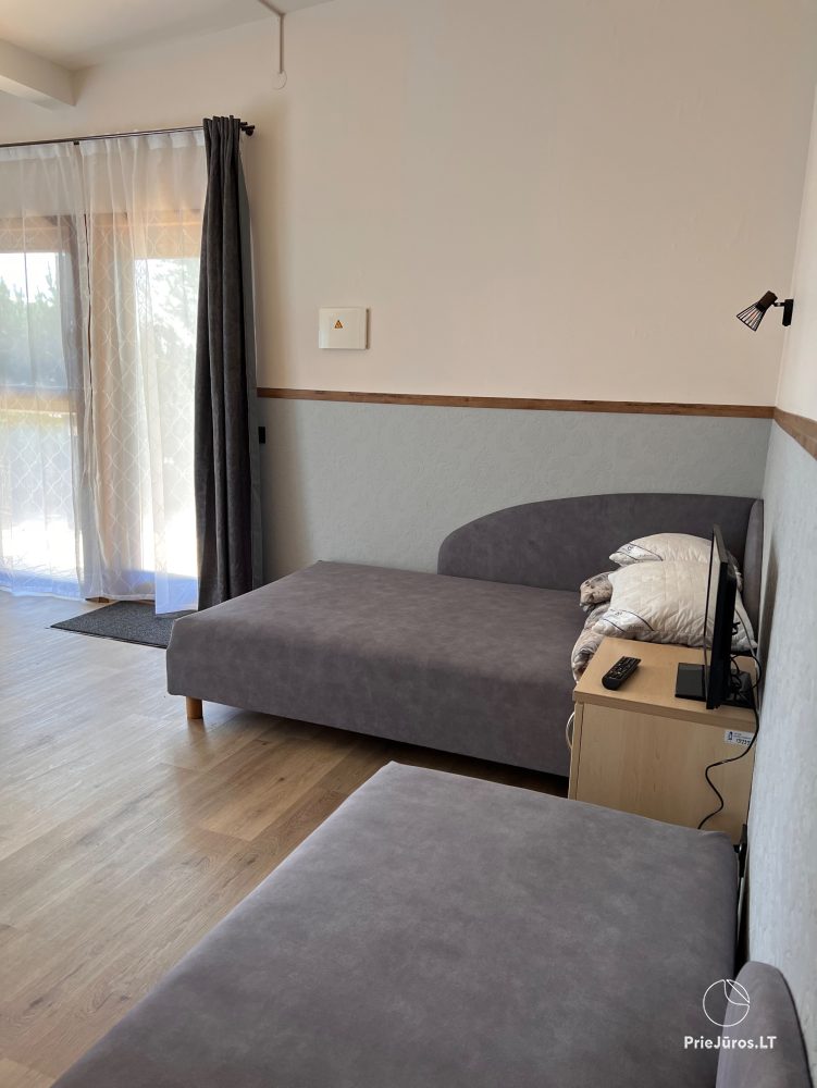 Vilnelė  Kompleks rekreacyjny: domki letniskowe, apartamenty, pokoje do wynajęcia blisko morza