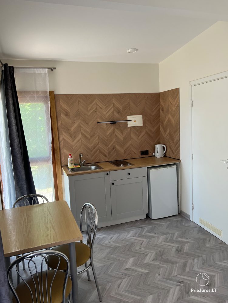 Vilnelė  Kompleks rekreacyjny: domki letniskowe, apartamenty, pokoje do wynajęcia blisko morza