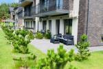 Przytulny apartament z tarasem do wynajęcia w Połądze
