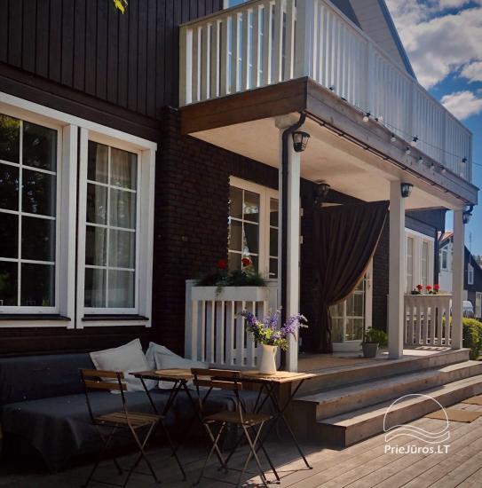 Riverfront Home - Skandynawskie domki na brzegu rzeki