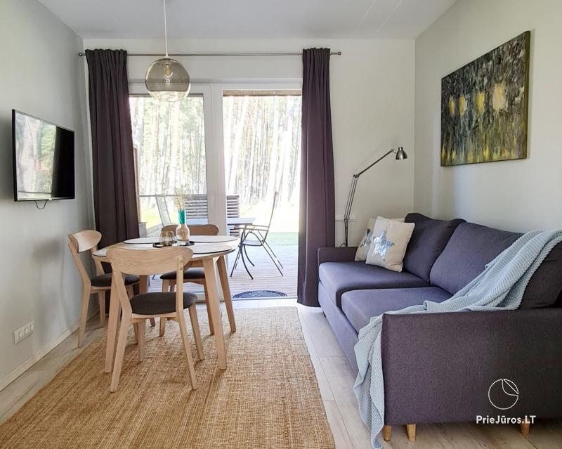 Preila Holiday - dwupoziomowy apartament w sosnowym lesie na Mierzei Kurońskiej