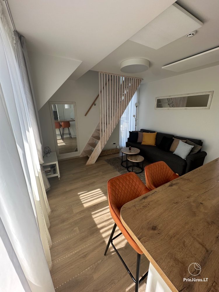 Przytulne apartamenty na twój wypoczynek w Kunigiškės z basenem na zewnątrz