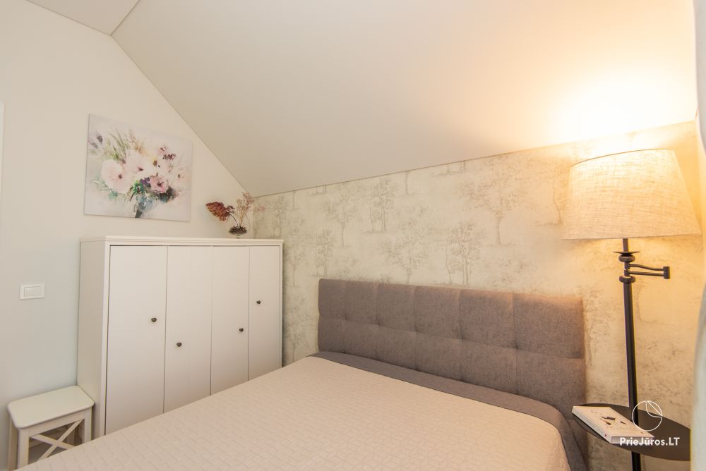 Domek Tarp berzu w Kunigiskiai