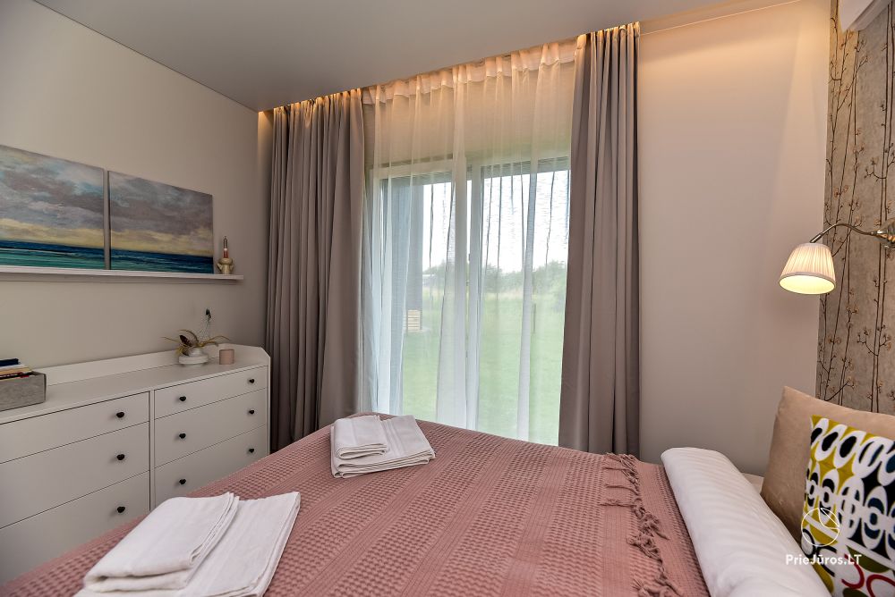 Zupełnie nowe apartamenty „Genys” z prywatnym podwórkiem i dużym tarasem