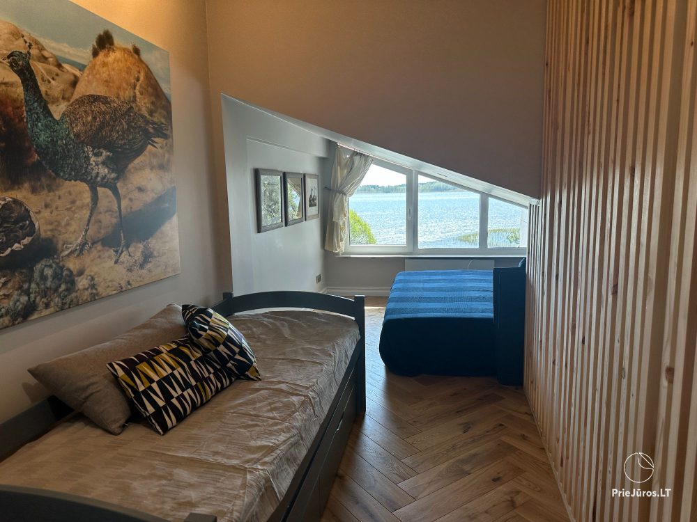 Stylowy apartament dla czterech osób w Pervalce nad brzegiem zalewu. Mieszkanie z tarasem dla dwóch osób w Juodkrante