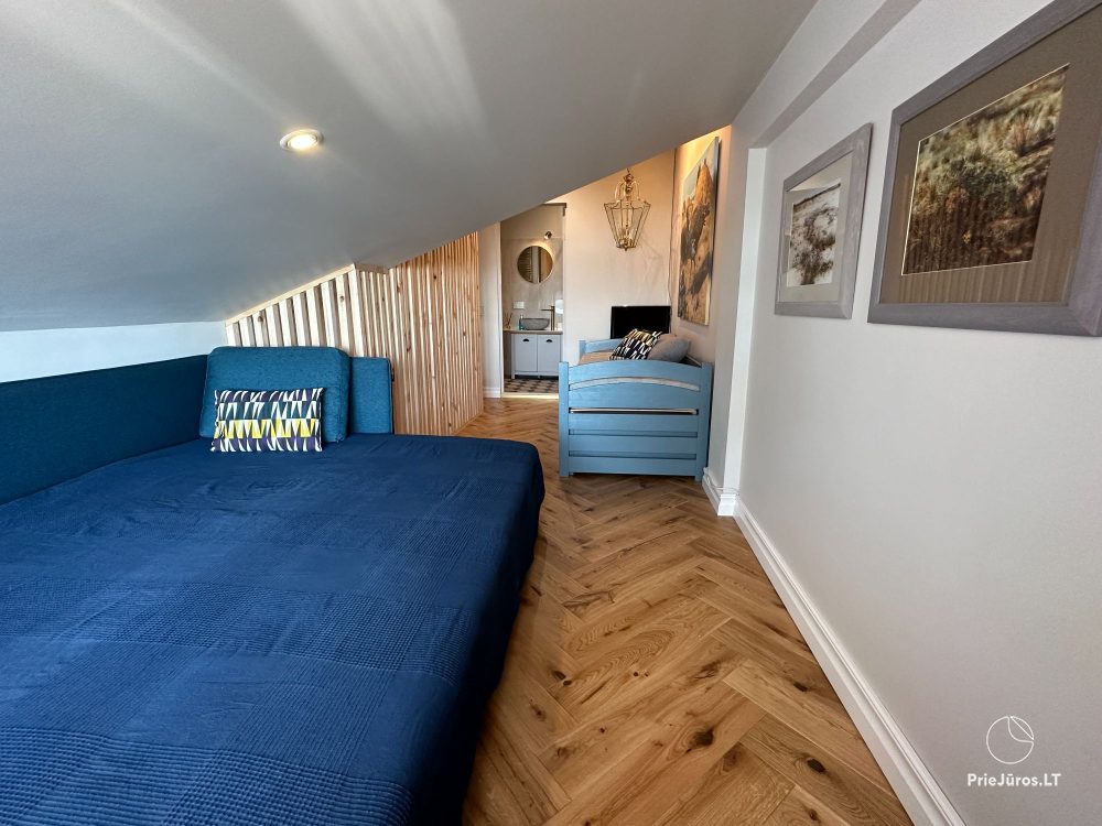 Stylowy apartament dla czterech osób w Pervalce nad brzegiem zalewu. Mieszkanie z tarasem dla dwóch osób w Juodkrante