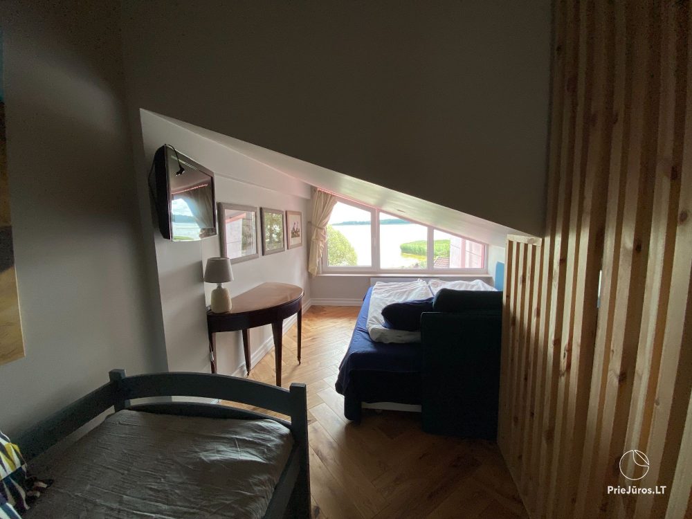Stylowy apartament dla czterech osób w Pervalce nad brzegiem zalewu. Mieszkanie z tarasem dla dwóch osób w Juodkrante