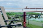 Dwupiętrowe apartamenty z tarasami na brzegu zalewu