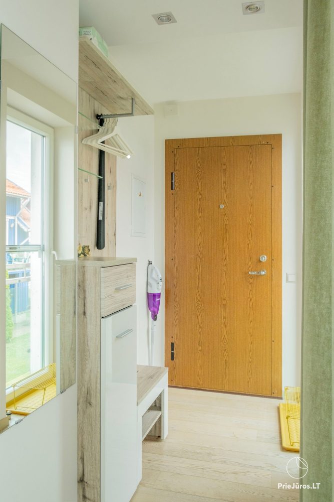 Dwupiętrowe apartamenty z tarasami na brzegu zalewu