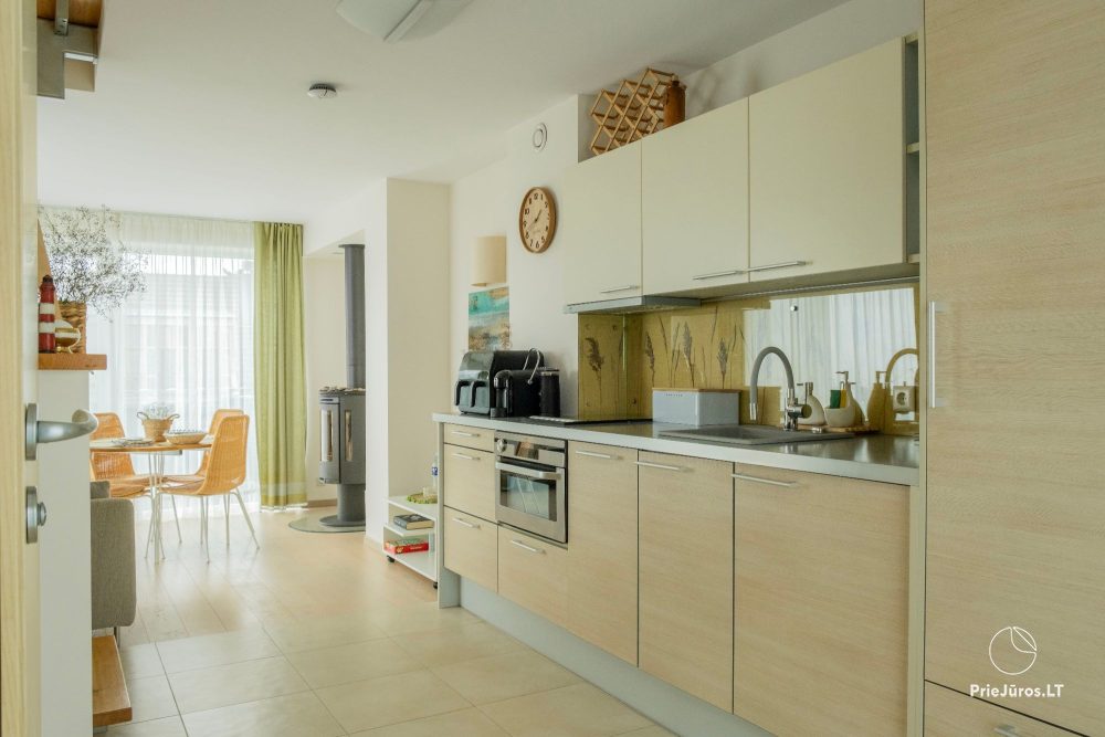 Dwupiętrowe apartamenty z tarasami na brzegu zalewu
