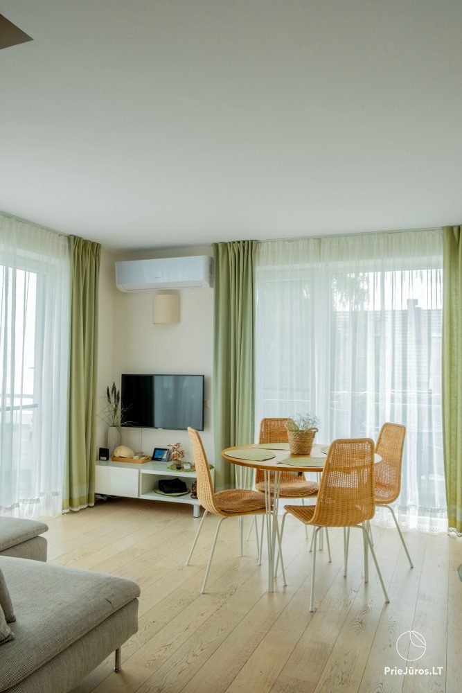 Dwupiętrowe apartamenty z tarasami na brzegu zalewu
