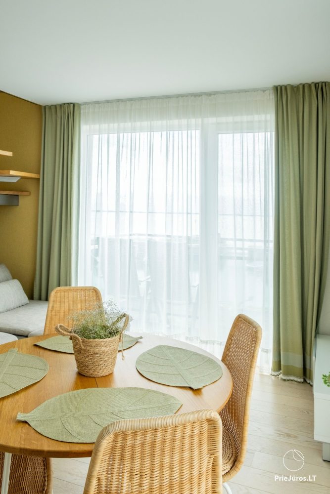Dwupiętrowe apartamenty z tarasami na brzegu zalewu