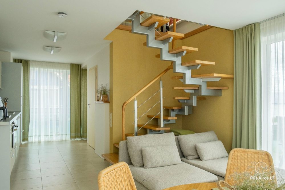 Dwupiętrowe apartamenty z tarasami na brzegu zalewu