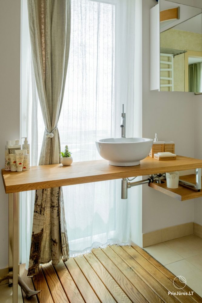 Dwupiętrowe apartamenty z tarasami na brzegu zalewu