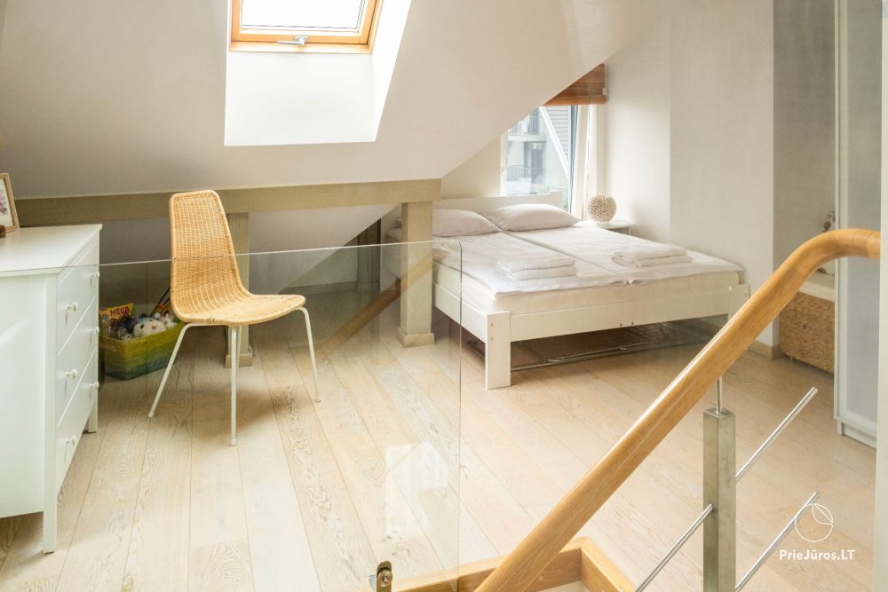 Dwupiętrowe apartamenty z tarasami na brzegu zalewu