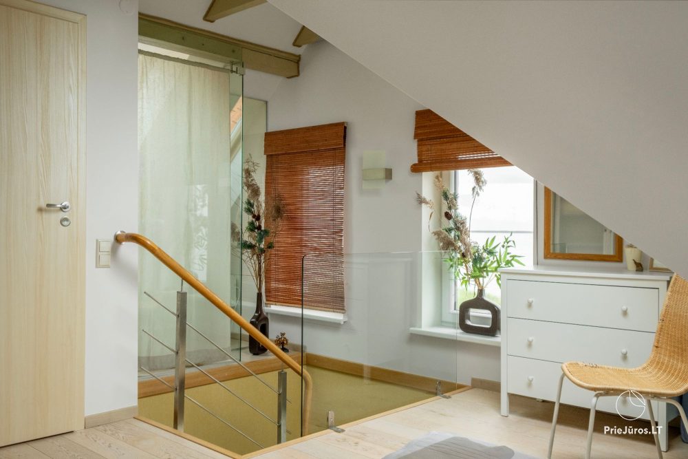 Dwupiętrowe apartamenty z tarasami na brzegu zalewu