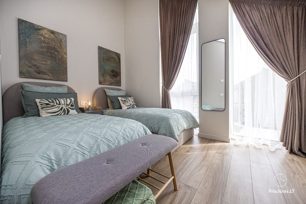 Lyrika home - w Monciškės - przestronny dom szeregowy z 2 sypialniami i tarasem dla czterech osób, w nowej dzielnicy J7 Beržas z basenami, saunami i grillem