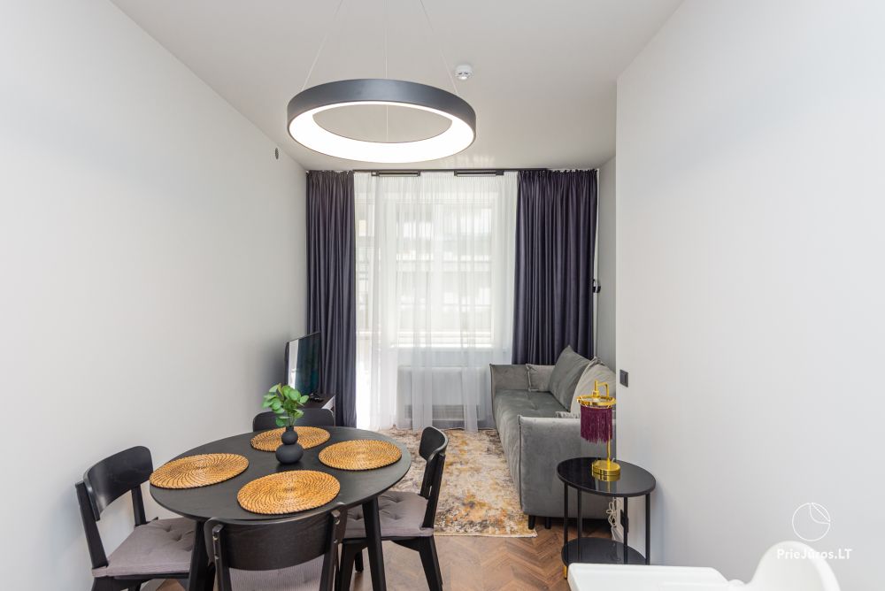 Apartamenty D21 – przytulny luksus w sercu Połągi