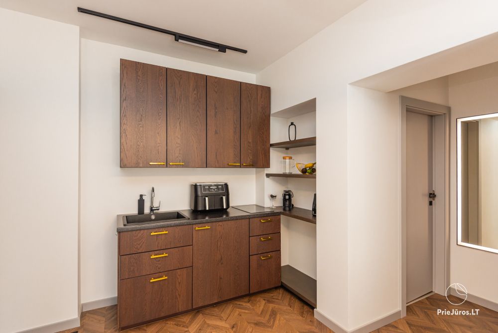 Apartamenty D21 – przytulny luksus w sercu Połągi