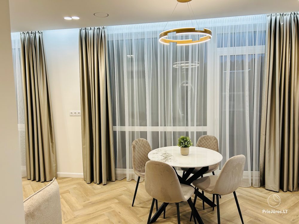 Apartamenty parkowe w centrum Kłajpedy. Nowe, przytulne mieszkanie 3-pokojowe z widokiem na jezioro, blisko Starego Miasta.