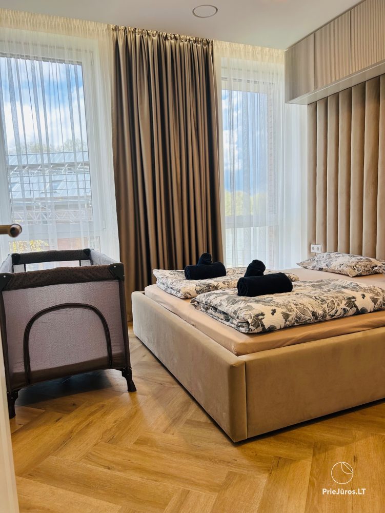 Apartamenty parkowe w centrum Kłajpedy. Nowe, przytulne mieszkanie 3-pokojowe z widokiem na jezioro, blisko Starego Miasta.