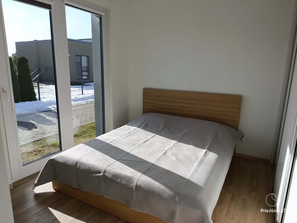 Wynajem domu w Kunigiškėse z tarasem i jacuzzi.