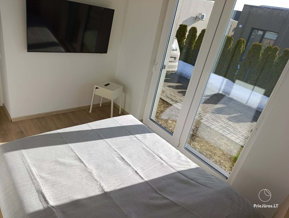Wynajem domu w Kunigiškėse z tarasem i jacuzzi.