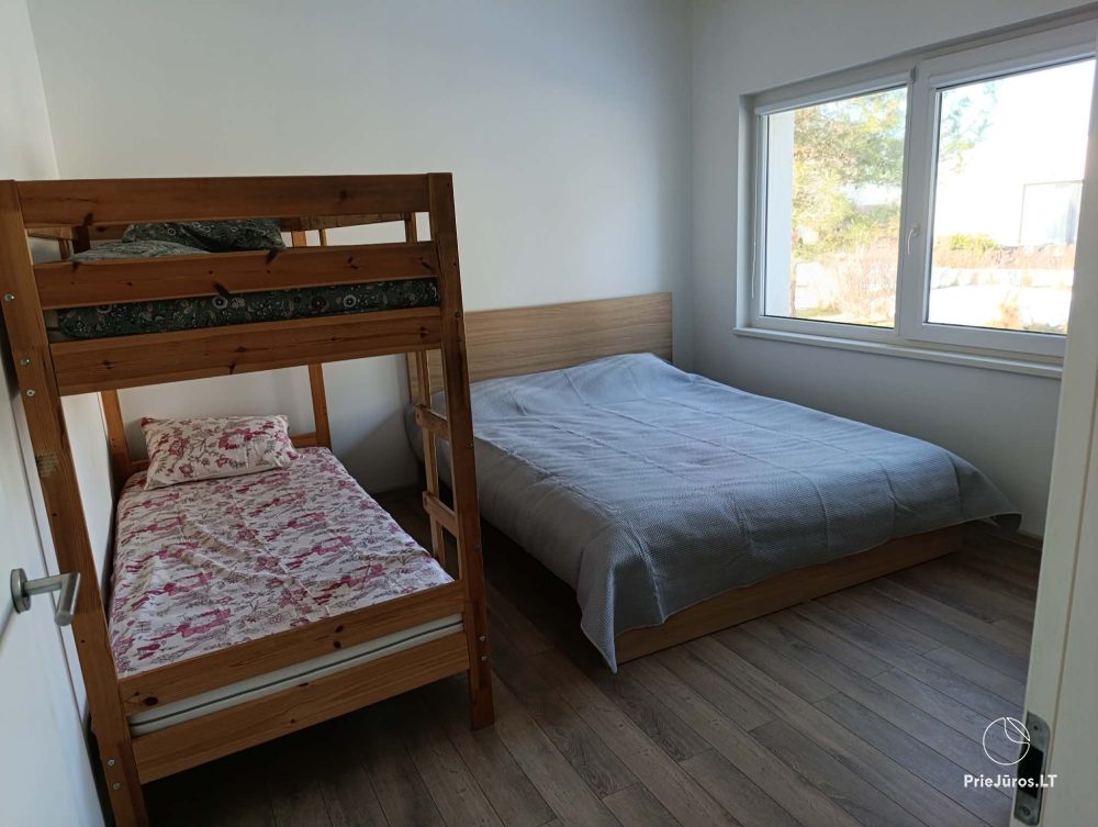 Wynajem domu w Kunigiškėse z tarasem i jacuzzi.