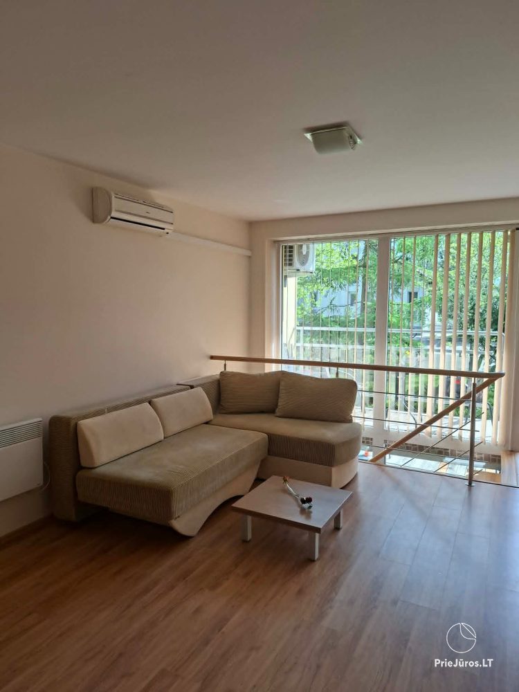 Dwupoziomowe apartamenty w centrum Juodkrantė