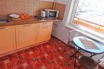 Jednopokojowe apartamenty ze wszystkimi udogodnieniami i drewnianymi domami w Sventoji