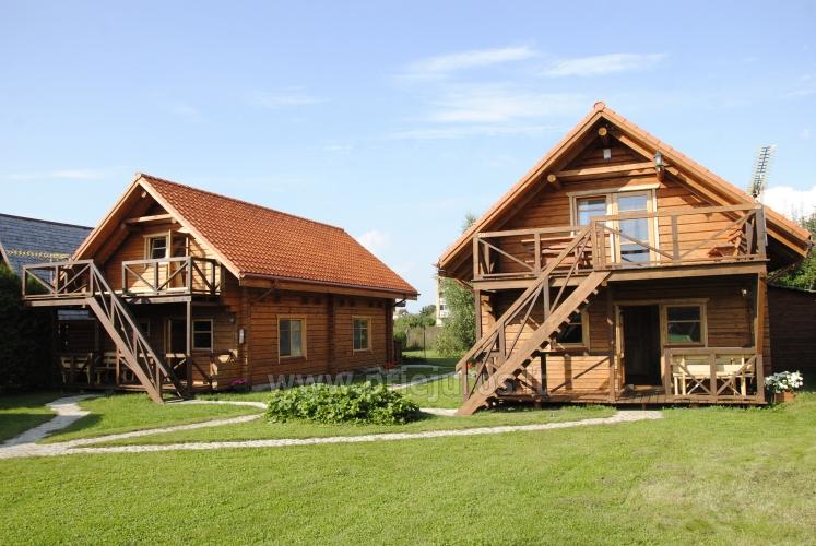 Dwupokojowe mieszkanie i pokoje do wynajęcia w Sventoji w drewnianym domu - 1