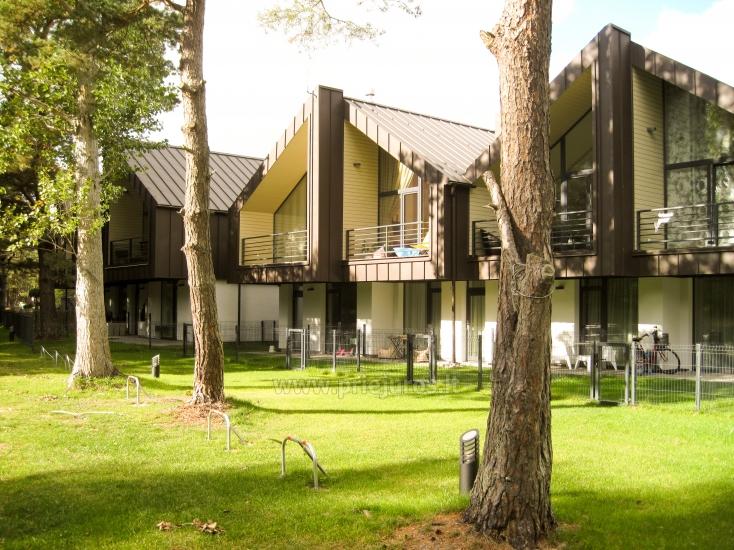 Apartament z tarasem i prywatnym podwórkiem w Kunigiskiai (Połąga) 300 m do morza