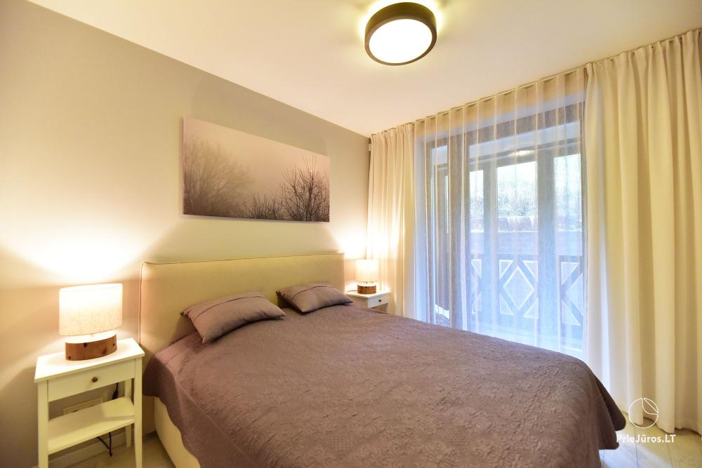 Nowy przestronny apartament Nidos Vilnelė z tarasem i bezpłatnym miejscem parkingowym w Nidzie