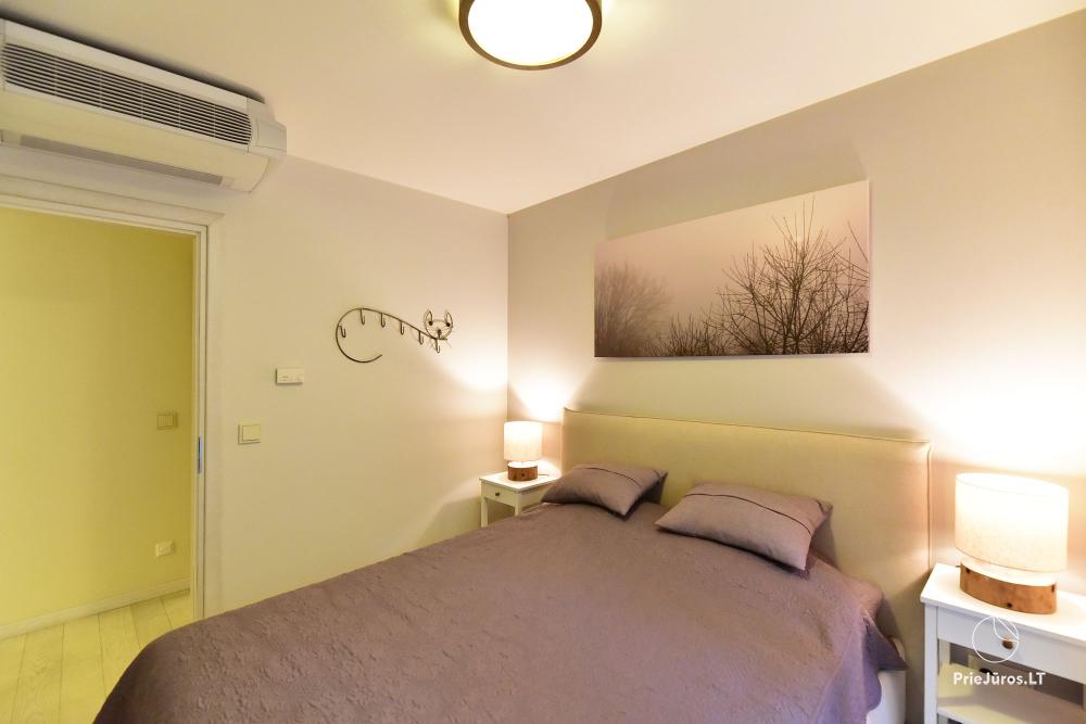 Nowy przestronny apartament Nidos Vilnelė z tarasem i bezpłatnym miejscem parkingowym w Nidzie