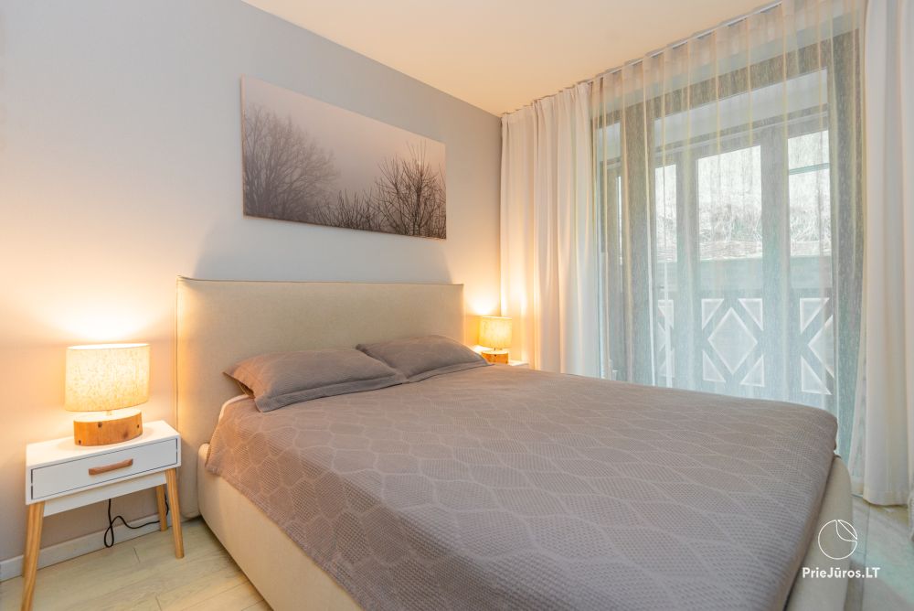 Nowy przestronny apartament Nidos Vilnelė z tarasem i bezpłatnym miejscem parkingowym w Nidzie