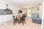 Apartament jednopokojowy z tarasem i oddzielnym wejściem z podwórka (1A)